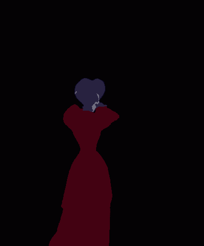 a lady in a red dress is standing in front of a window with her arms outstretched