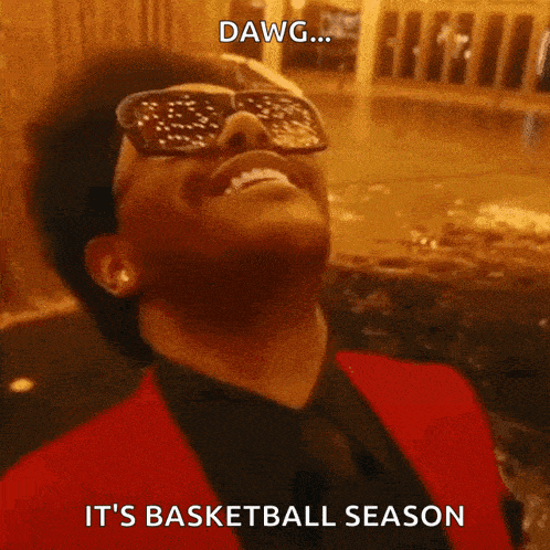 a man wearing sunglasses and a red suit with the words dawg it 's basketball season
