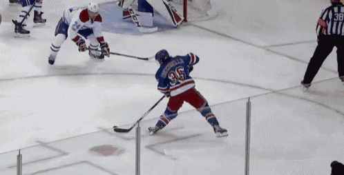 a hockey player wearing a jersey with the number 95 on it