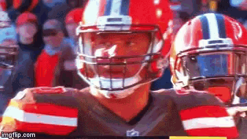 a football player wearing a helmet with the number one on it