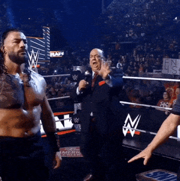 Roman Reigns Paul Heyman GIF