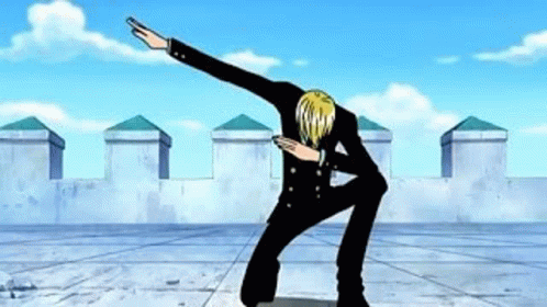 a man in a black suit is doing a dab in front of a castle .