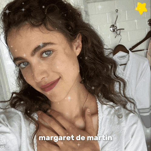 a woman taking a selfie with the name margaret de martin below her