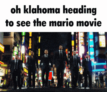 a group of men in suits and ties are walking down a street with the words oh klahoma heading to see the mario movie