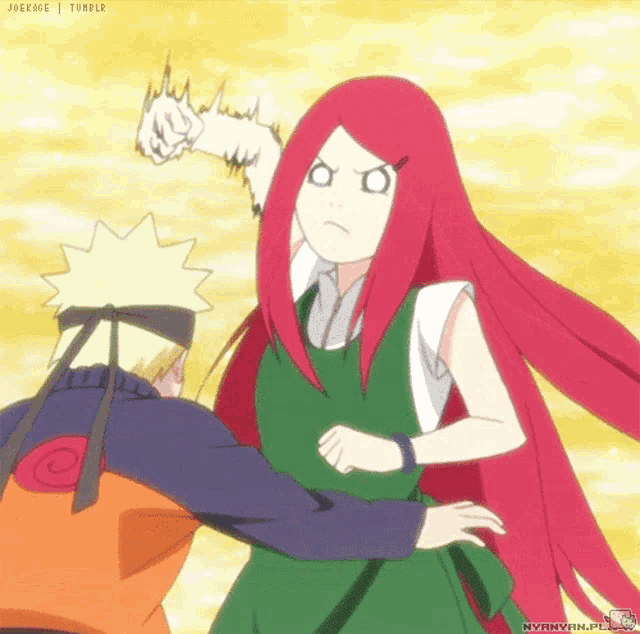 a girl with red hair is standing next to a man with a bandana around his head