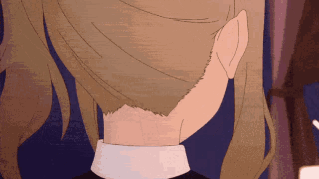 a close up of a woman 's neck with a white collar