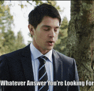 a man in a suit and tie with whatever answer you 're looking for written on the bottom