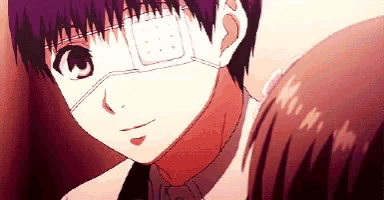a close up of a boy with a bandage on his eye and a girl behind him .