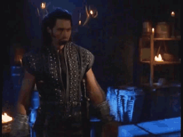 a man in a black vest says so tell me why i should n't kill you