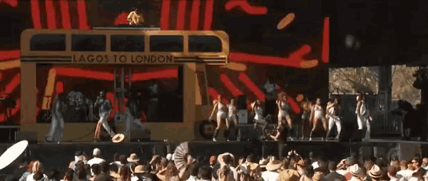 a yellow double decker bus that says lagos to london on the side