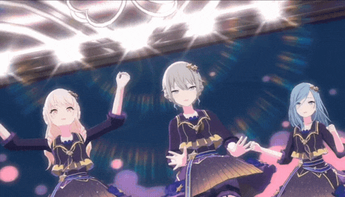 three anime girls are dancing on a stage in front of a crowd