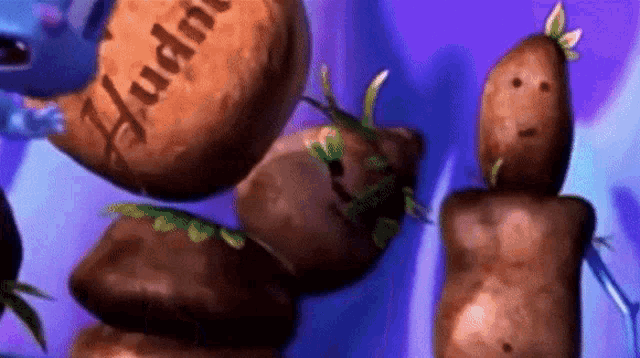 a cartoon drawing of a potato with the word huddle written on it