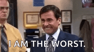 a man in a suit and tie is smiling and says `` i am the worst '' .