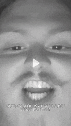 a black and white photo of a man 's face with the caption guys caseoh is at my house what do i do