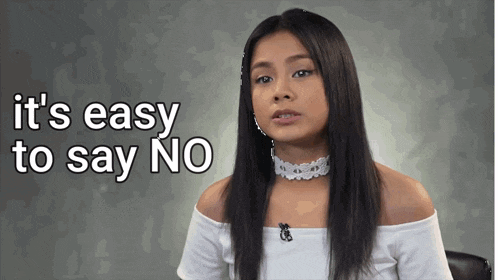 a woman says it 's easy to say no in front of a gray background