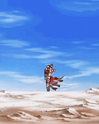 a person standing in the middle of a desert holding a sign that says ' a ' on it