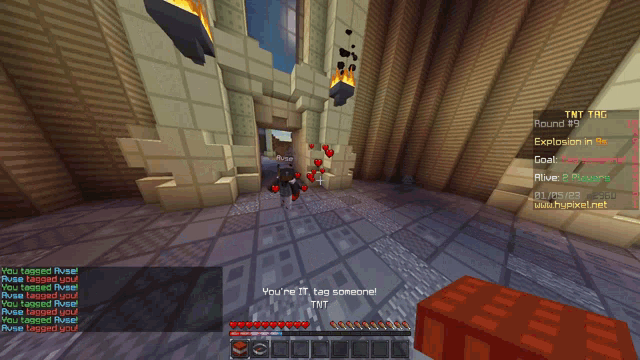 a screenshot of a minecraft game shows a red teddy bear surrounded by hearts