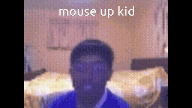a blurry picture of a person with the words mouse up kid written on the bottom