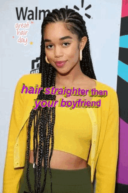 a woman with braids is wearing a yellow jacket and a yellow top