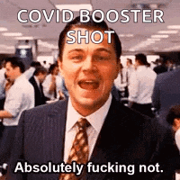 a man in a suit and tie is making a funny face while talking about a covid booster shot .