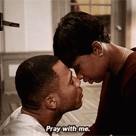a man and a woman are kissing and the woman is saying pray with me .