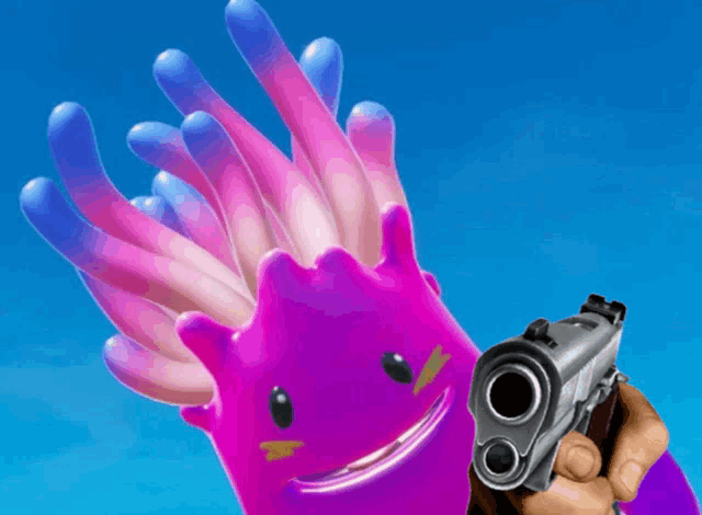 a person is holding a gun in front of a pink and blue monster