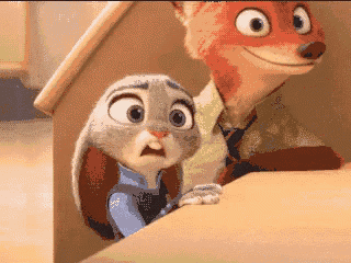 a fox and a rabbit from zootopia looking at something
