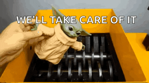 a person is holding a baby yoda toy in front of a shredder and the words we 'll take care of it