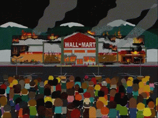 a crowd of people gathered in front of a wall mart