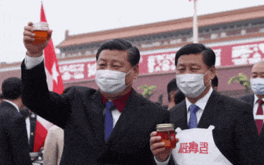 two men wearing face masks are holding jars of food
