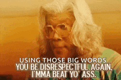 a woman wearing glasses is talking about using those big words .
