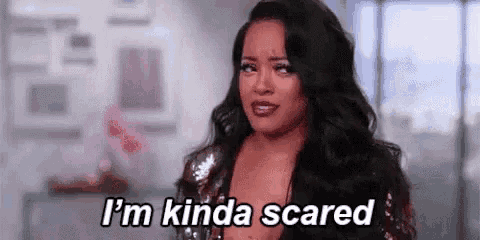 a woman is saying `` i 'm kinda scared '' in a room .
