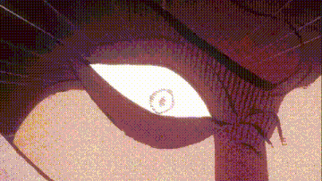 a close up of a giant eye with a light coming out of it .