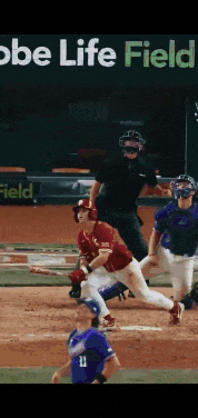 a baseball game is being played on adobe life field