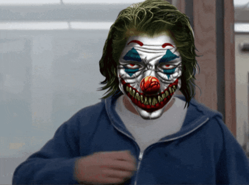 a man wearing a clown mask and a blue jacket