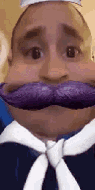 a man with a purple mustache and a white tie is wearing a sailor costume .