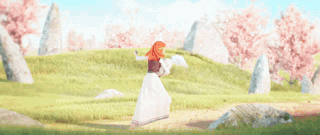 a girl in a white dress is dancing in a field