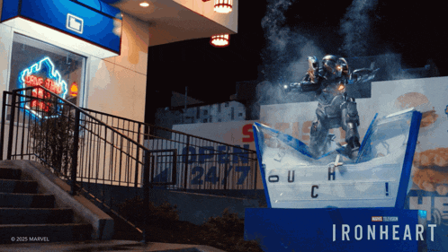a movie poster for ironheart shows a man in a superhero suit