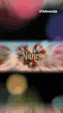 a blurry image of flowers with the name nancy written in gold