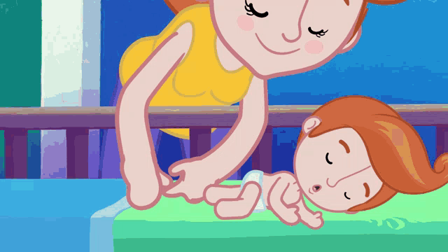a woman in a yellow shirt is changing a baby 's diaper