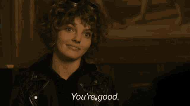 a woman in a leather jacket is saying you 're good
