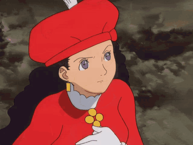 a girl in a red hat and white gloves