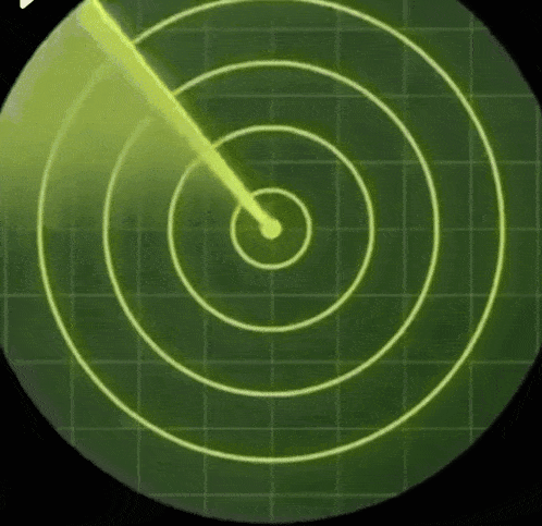a radar screen shows a green circle with a white arrow pointing to it .