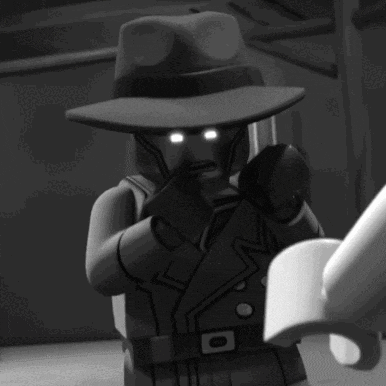 a black and white image of a lego character with glowing eyes