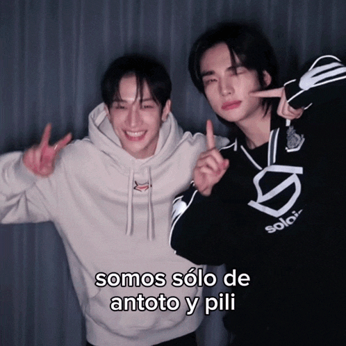 two young men are posing for a picture with the caption somos solo de antoto y pill