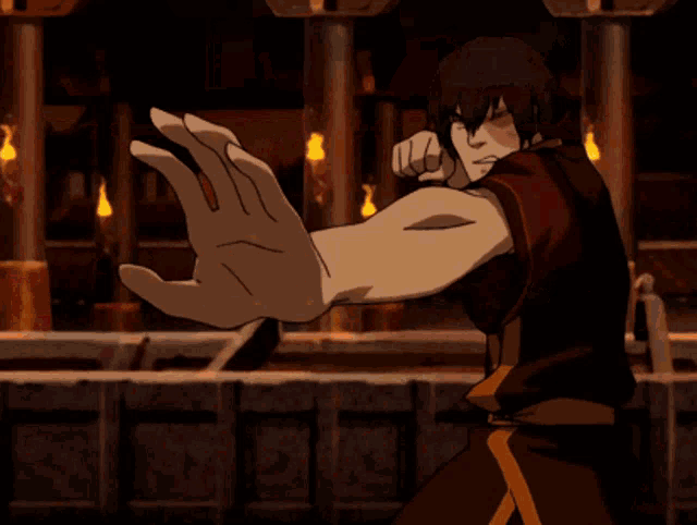 a cartoon character is holding a large fireball
