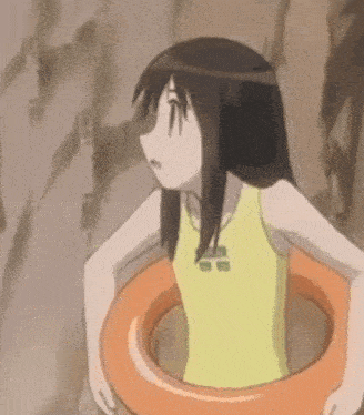 a girl in a yellow tank top is holding an orange float in her hands .