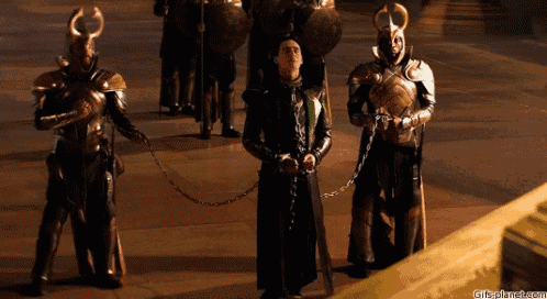 a group of warriors are chained to each other with gifsplanet.com written on the bottom
