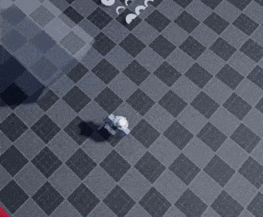 a video game is being played on a checkered floor .