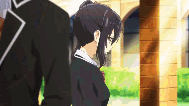 a man and a girl standing next to each other